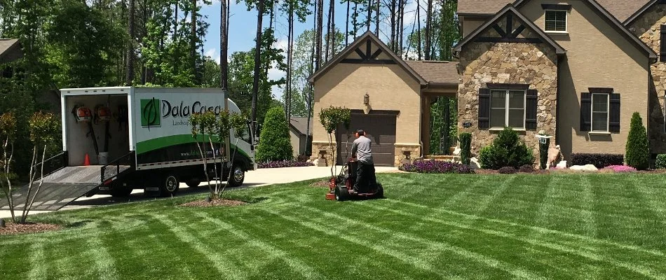 Crew mowing a lawn in Lake Norman, NC.