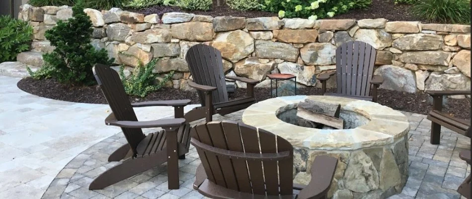 A stone fire pit on a patio in Matthews, NC.