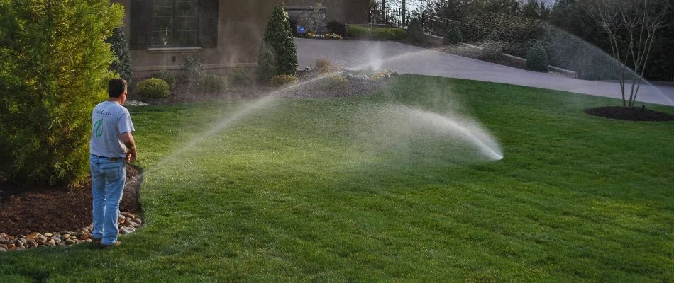 Professional working on an irrigation system in Charlotte, NC.