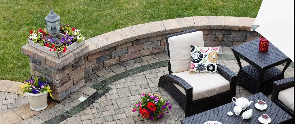 A seating wall along the edge of a patio.