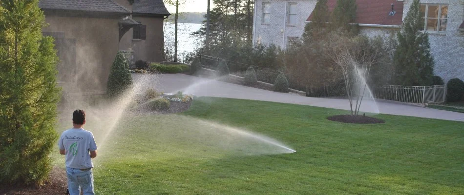 Sprinklers spraying water on grass in Concord, NC.